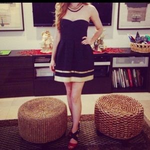 Black and golden accent mini strapless dress